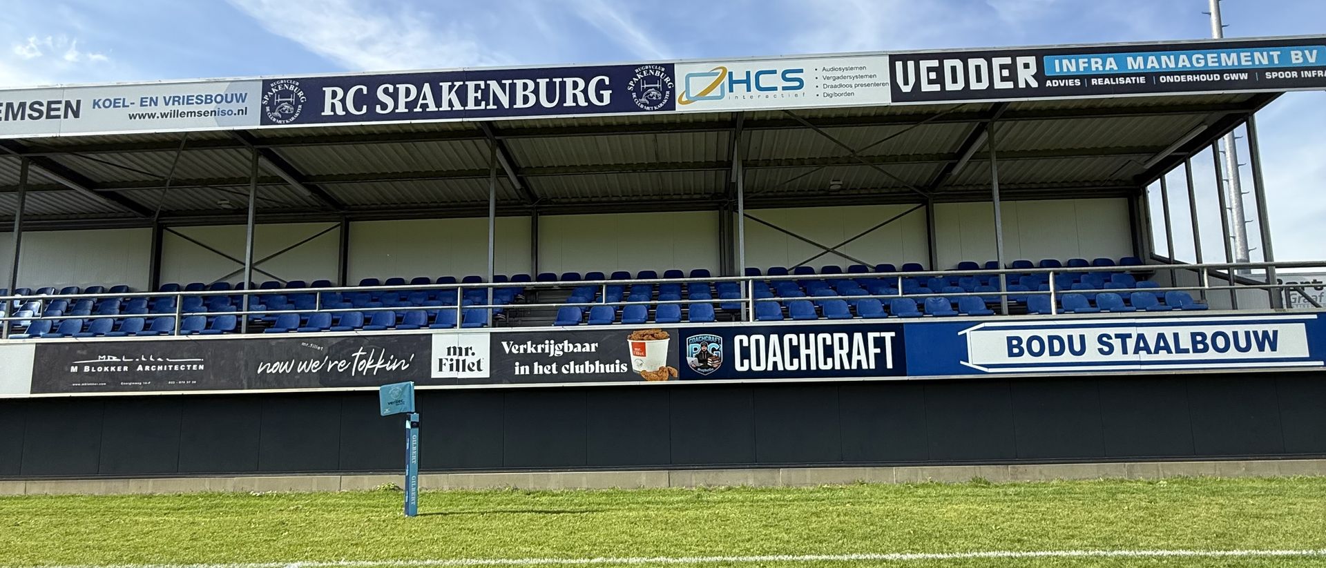 CoachCraft sponsorship board on the main stand at Rugby Club Spakenburg